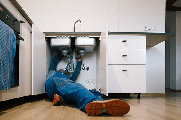 Professional Drain Cleaning technician working in Washington, NC